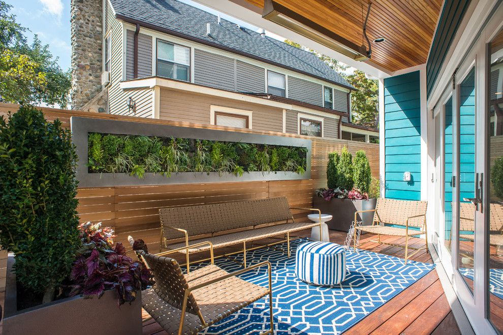 Dox Furniture for a Contemporary Deck with a Navy and White Rug and an Urban Oasis by Lotus Gardenscapes & Bloom Garden Center