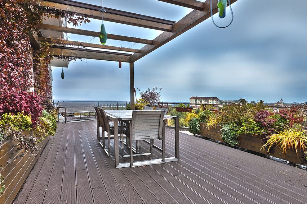 Dox Furniture for a Contemporary Deck with a Pendant Lighting and the Views by Diego Bortolato Architetto