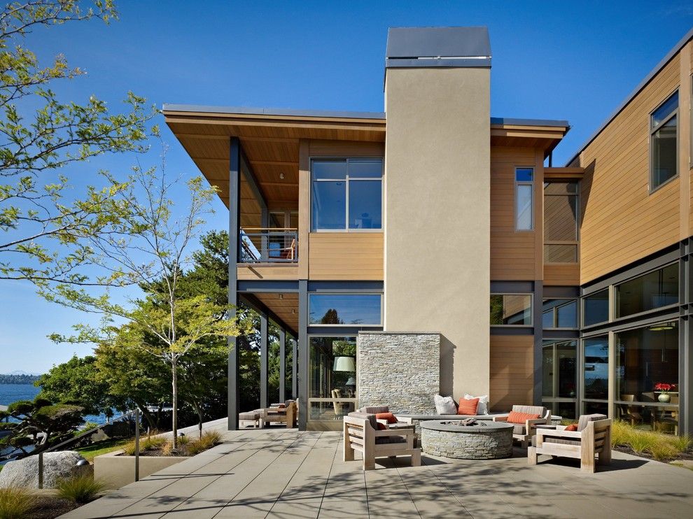 Dryvit for a Modern Patio with a Stone Chimney and Lake House Two   Patio by Mcclellan Architects