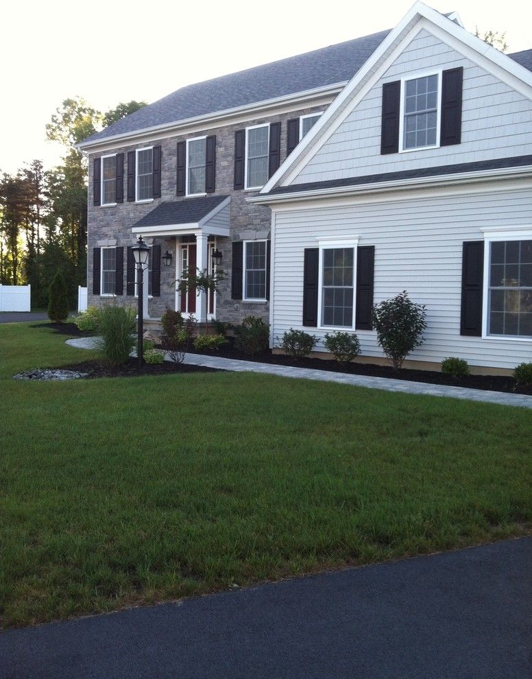 Dunhill Homes for a Traditional Exterior with a Brick Exterior and the Normandy by Viscusi Builders Ltd.