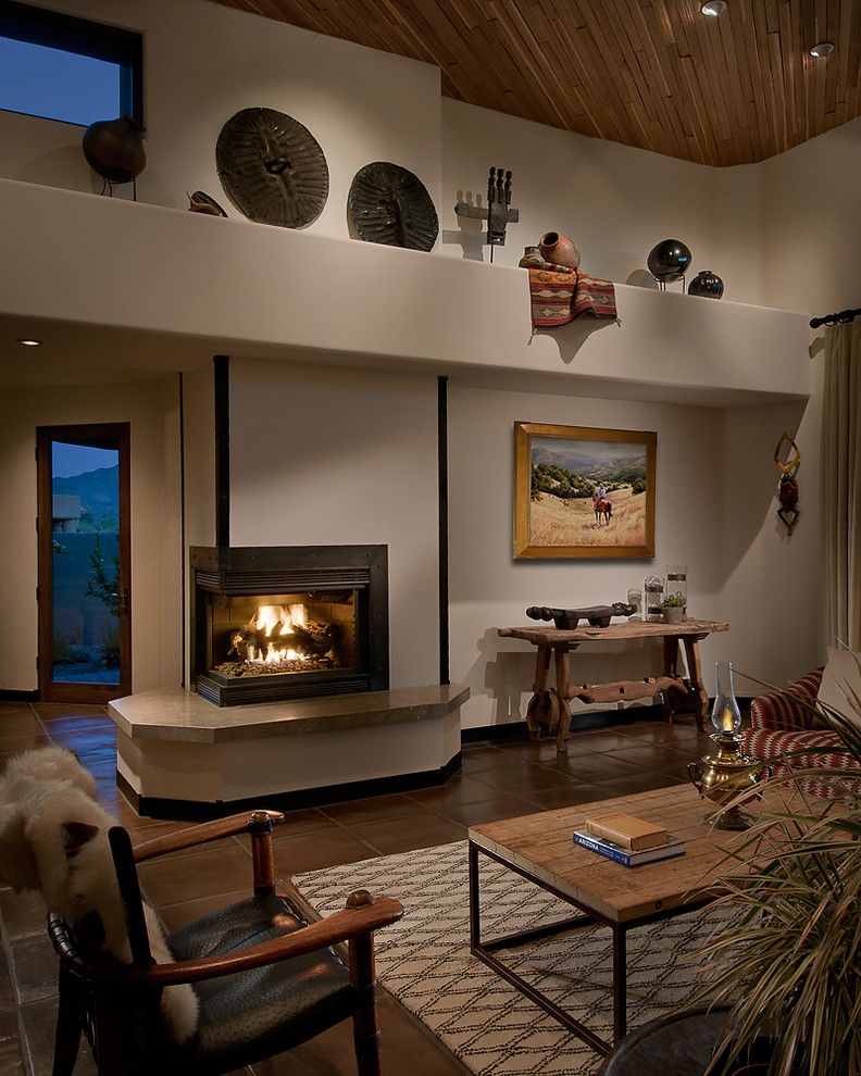 Dunn Edwards Swiss Coffee for a Southwestern Family Room with a Hearth and Arizona Ranch by Angelica Henry Design