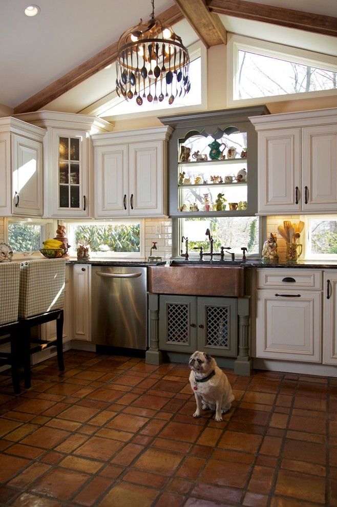 Dura Supreme Cabinets for a Rustic Kitchen with a Terra Cotta and Tri Color Kitchen by Merri Interiors, Inc.