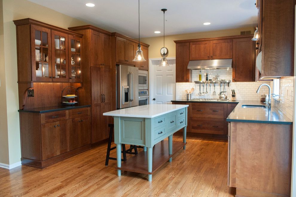 Dura Supreme for a Craftsman Kitchen with a Contrasting Cabinets and West Chester Kitchen Featuring Dura Supreme Craftsman Panel Door by Pine Street Carpenters & the Kitchen Studio