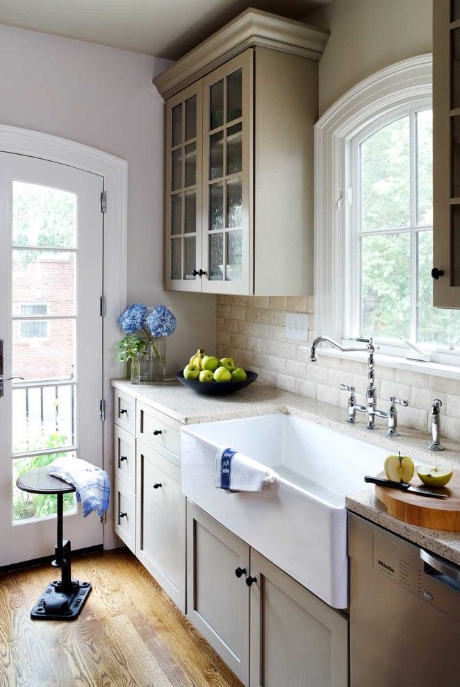 Durango Doors for a Traditional Kitchen with a Farmhouse Sink and Row House Kitchen Remodel by Wentworth, Inc.