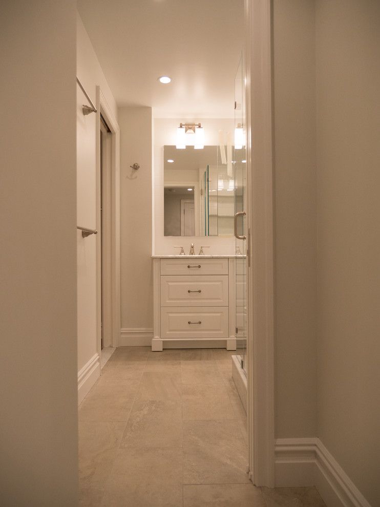 Dykes Lumber for a Traditional Bathroom with a Custom Made Vanity and Prewar Gut Renovation by Paula Mcdonald Design Build & Interiors