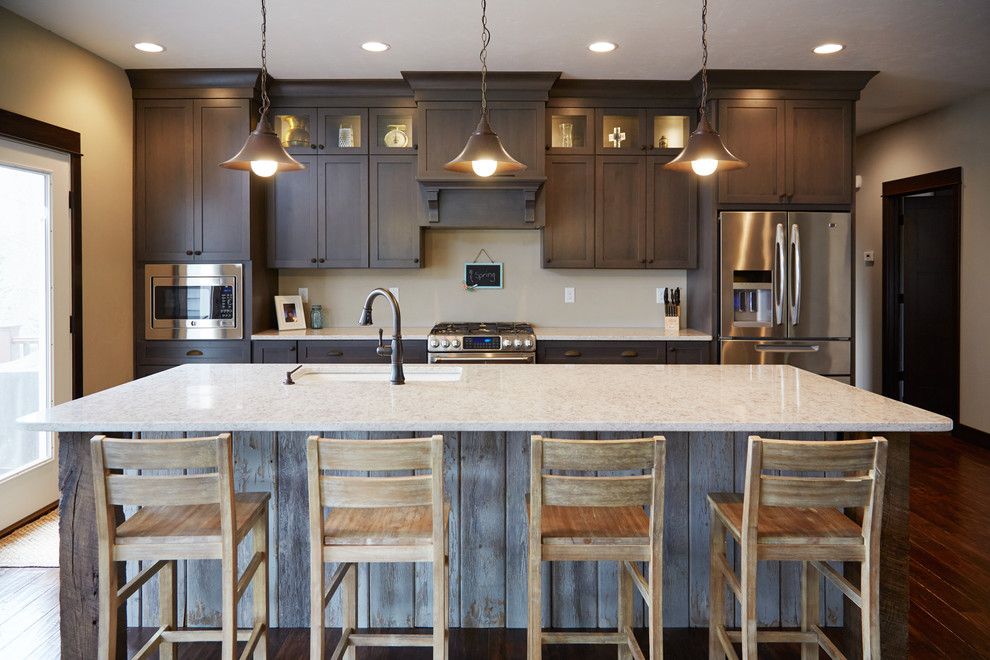 Dynasty Cabinets for a Modern Kitchen with a Quartz and Kitchen with Decorative Reclaimed Wood Accent and Ceiling Height Cabinets by Gerhard's Kitchen & Bath Store