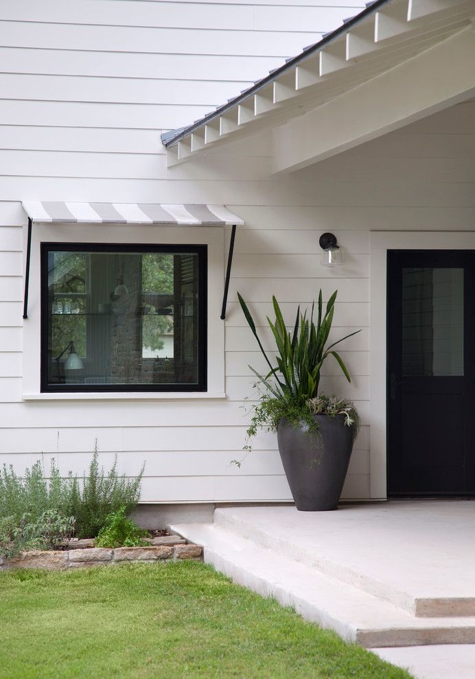 Electric Schoolhouse for a Farmhouse Entry with a Black and White and Modern Farm House by Tim Cuppett Architects