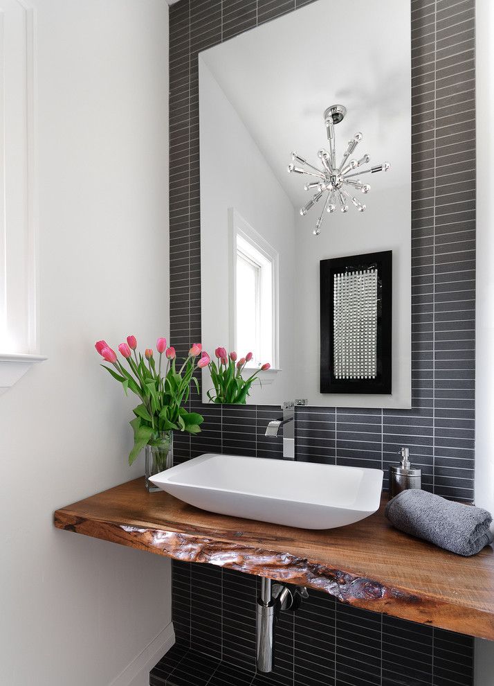 Eleganza Tile for a Contemporary Powder Room with a Modern Sink and Powder Room by Jodie Rosen Design