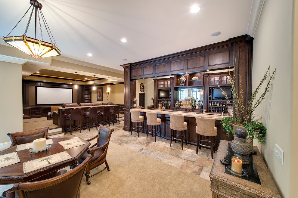 Elk Grove Theater for a Traditional Basement with a Dark Wood Dining Chair and Traditional Basement by Hbdbuilder.com