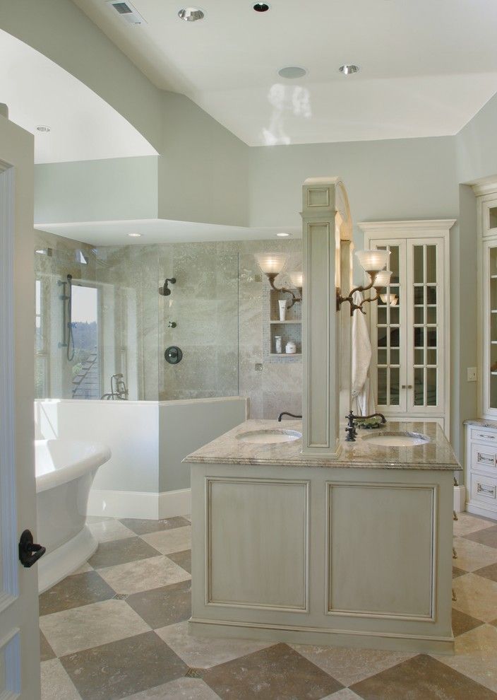 Eloquence Furniture for a Traditional Bathroom with a Limestone Floor Tiles and Montauk Master Bathroom by Tina Barclay