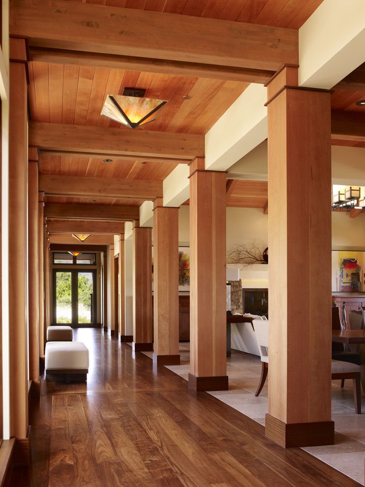 Engineered Hardwood vs Laminate for a Contemporary Hall with a Wood Floor and Earthy Modern by Noel Cross+Architects