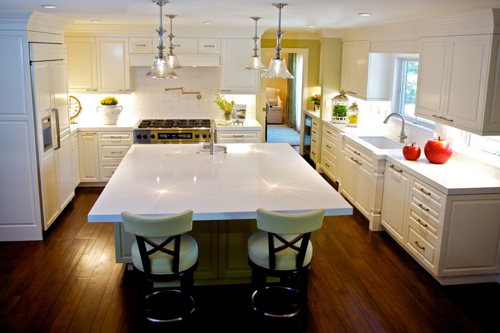 Engineered Hardwood vs Laminate for a Traditional Kitchen with a Built in and Casual and Elegant White Kitchen by Van Zee Design Interiors