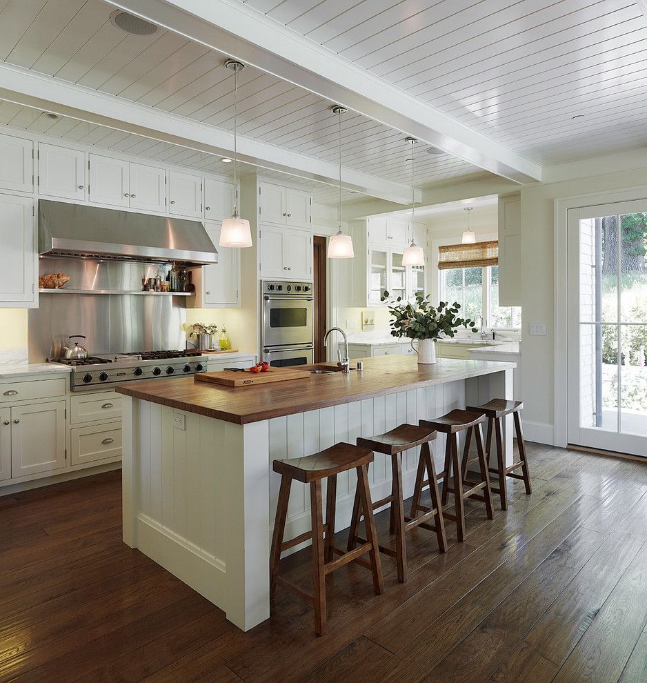 Engineered Hardwood vs Laminate for a Traditional Kitchen with a Stainless Steel Rangetop and Residence in California by Taylor Lombardo Architects