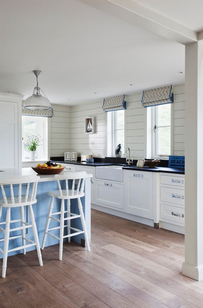 Engineered Hardwood vs Solid Hardwood for a Beach Style Kitchen with a Recessed Lighting and Trebarwith by Stephen Graver Ltd