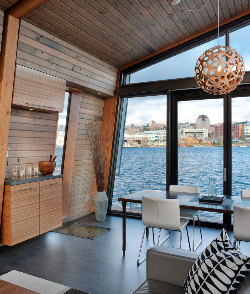 Environmental Stoneworks for a Contemporary Dining Room with a Wood Paneling and Dyna   Portage Bay by Dyna Contracting