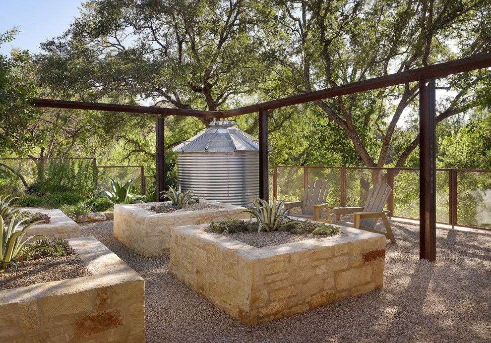 Environmental Stoneworks for a Mediterranean Landscape with a Steel Beams and Scenic by Root Design Company.com