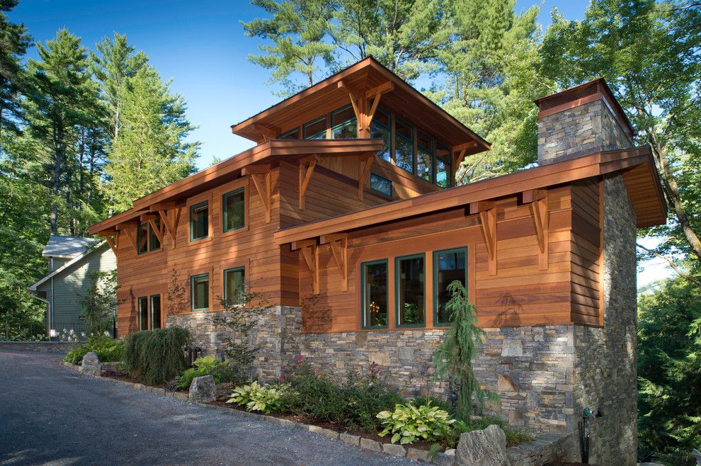 Environmental Stoneworks for a Modern Exterior with a Douglas Fir and Lake Luzerne House by Phinney Design Group
