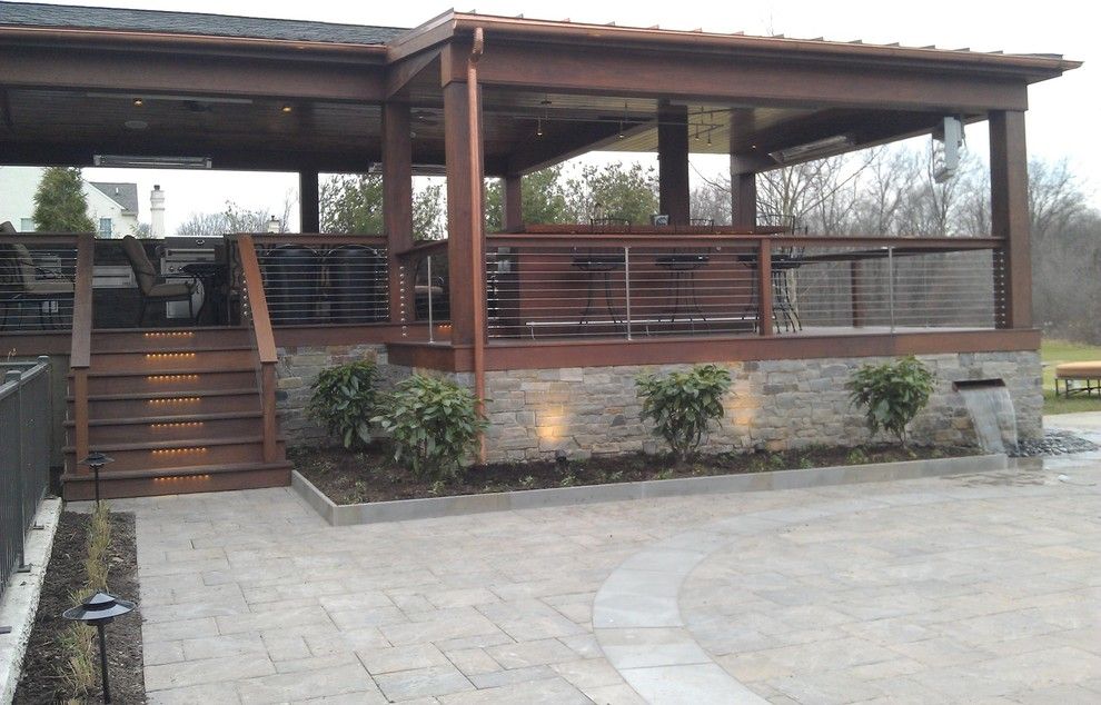 Environmental Stoneworks for a Modern Porch with a Deck and Modern/contemporary Deck and Bar by Environmental Landscape Associates