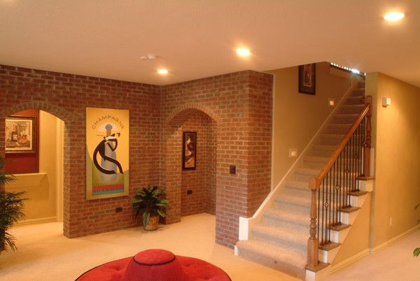 Estridge Homes for a Traditional Basement with a Traditional and Interiors by Estridge Homes