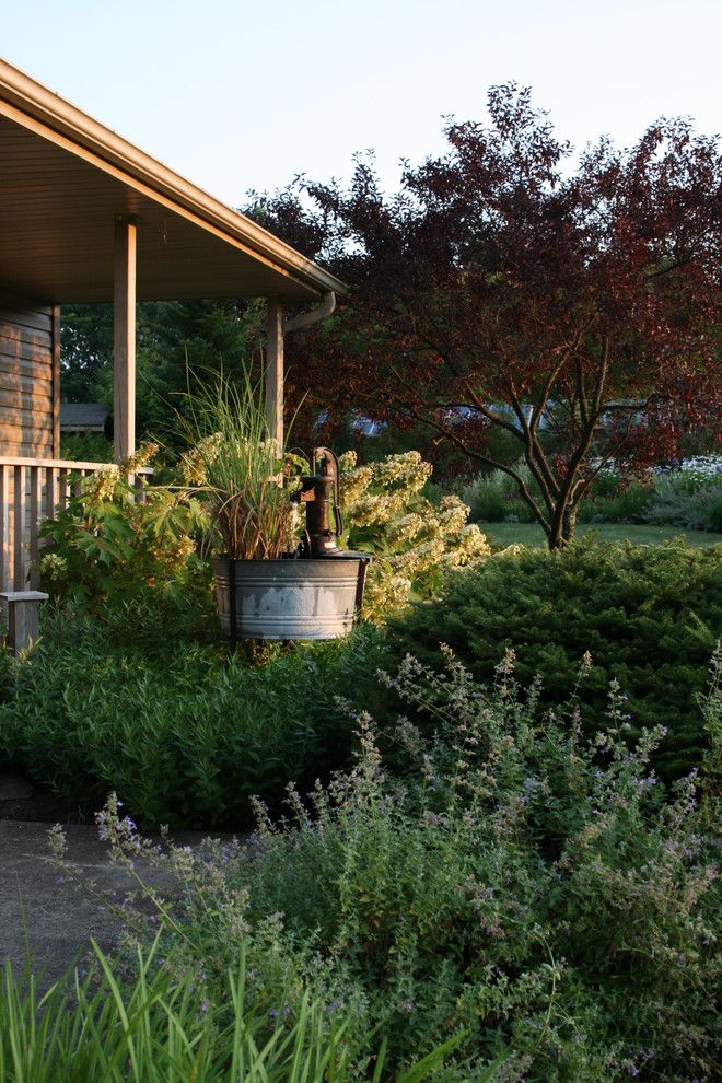 Everglades Farm Equipment for a Traditional Landscape with a Garden Shed and Central Pennsylvania Country Home by Zh Design