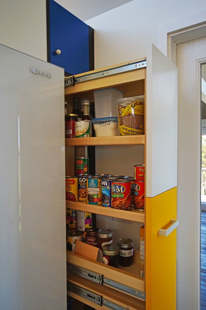 Executive Cabinetry for a Midcentury Kitchen with a Colorful Kitchen and Inspiration by Mondrian by Hunter and Company