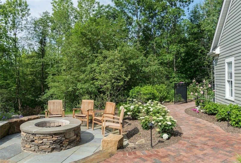 Exscape for a Traditional Patio with a Firepit and Chagrin Falls Patio by Exscape Designs