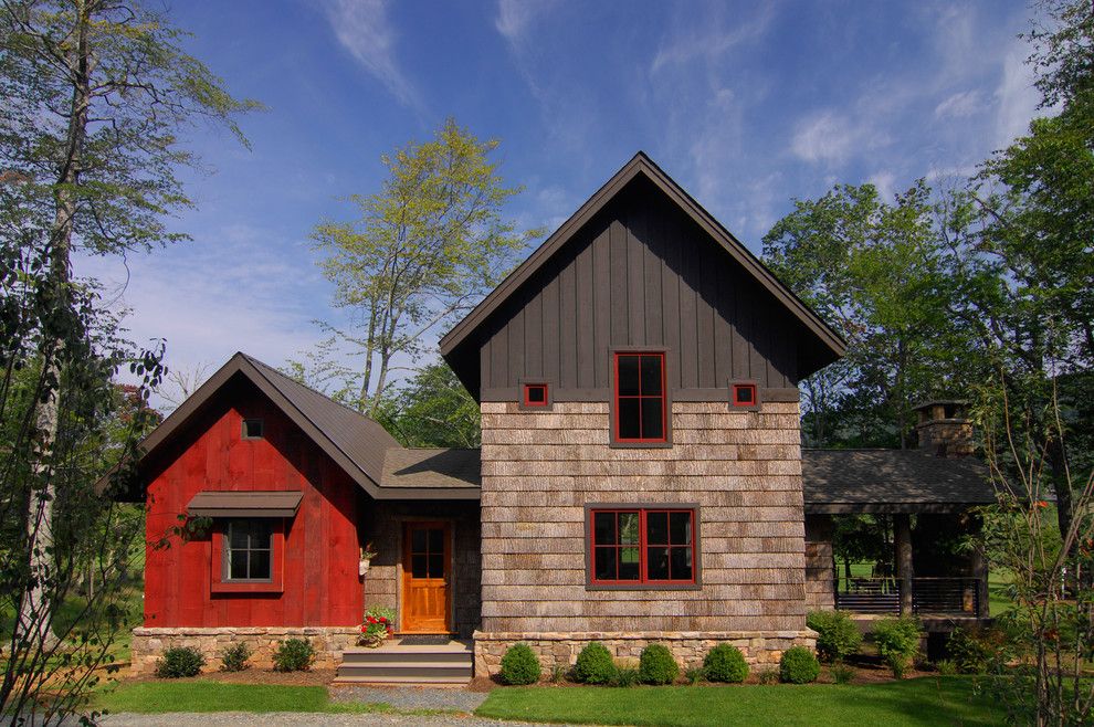 Extech Building Materials for a Rustic Exterior with a Red Flowers and Bark House Shingle Siding and Reclaimed Barnwood Siding by Christopher Kellie Design Inc.