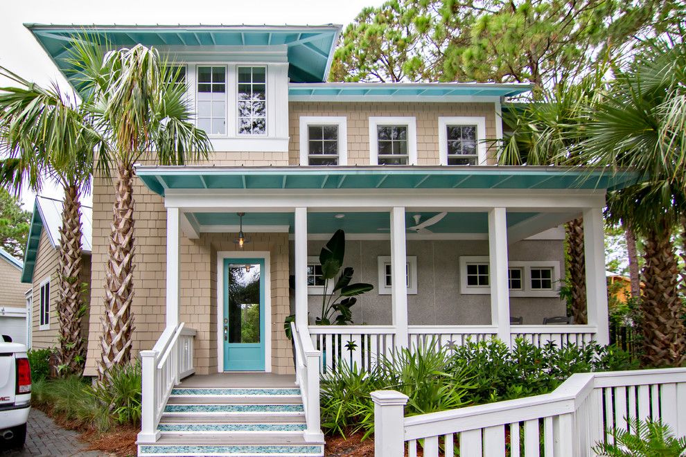 Exterior Color Schemes for a Tropical Exterior with a Blue Mosaic Tile Steps and Hgtv Smart Home 2013 by Glenn Layton Homes