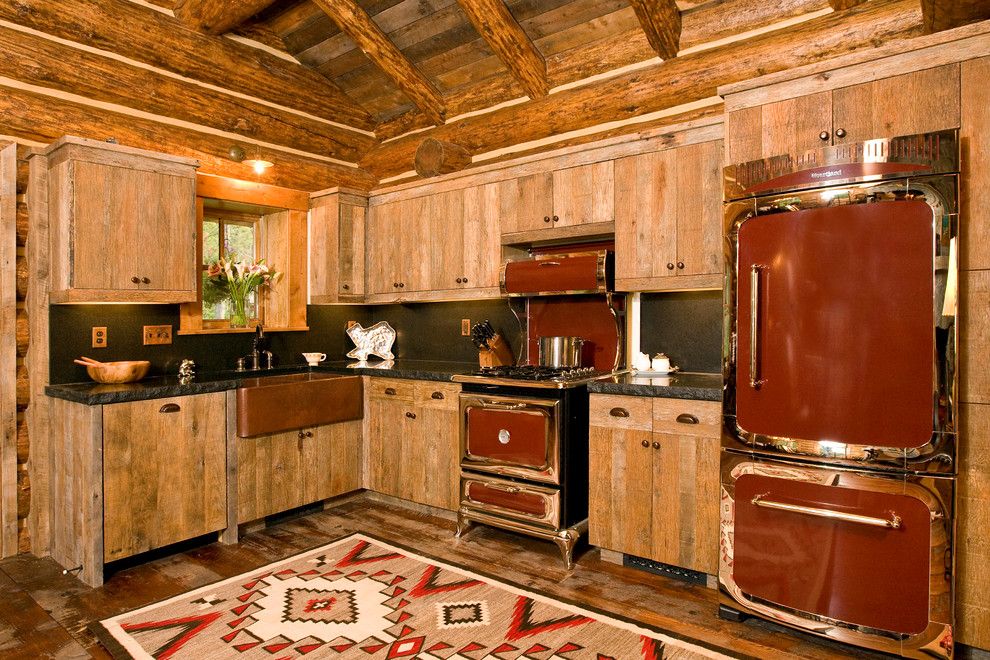 Factory Direct Appliance for a Rustic Kitchen with a Red and Chrome Appliances and Kitchens by Teton Heritage Builders