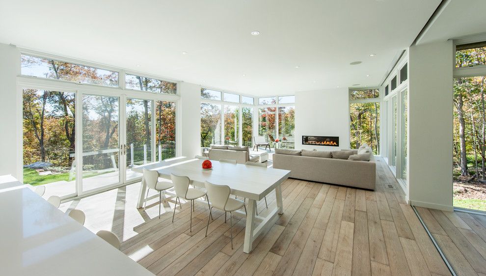 Fairfield Chair for a Contemporary Dining Room with a Gray Sectional Sofa and Marvin Windows and Doors by Marvin Windows and Doors