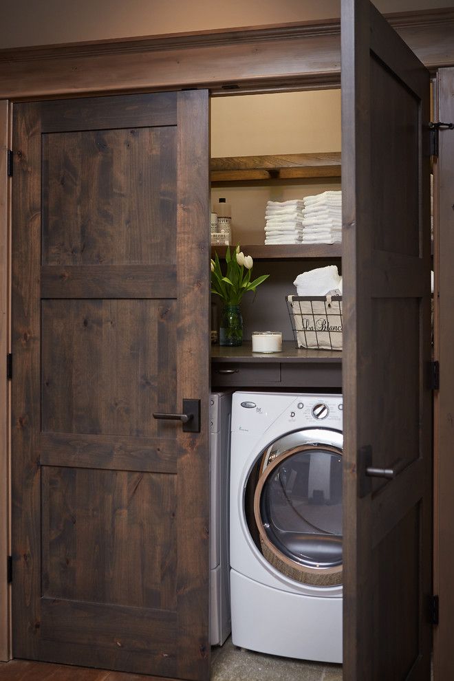 Feather River Doors for a Rustic Laundry Room with a Comfortable and Crooked River Home by Villa Decor