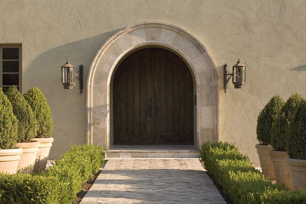 Feather River Doors for a Traditional Entry with a Path and Greenlee Entry by Hugh Jefferson Randolph Architects