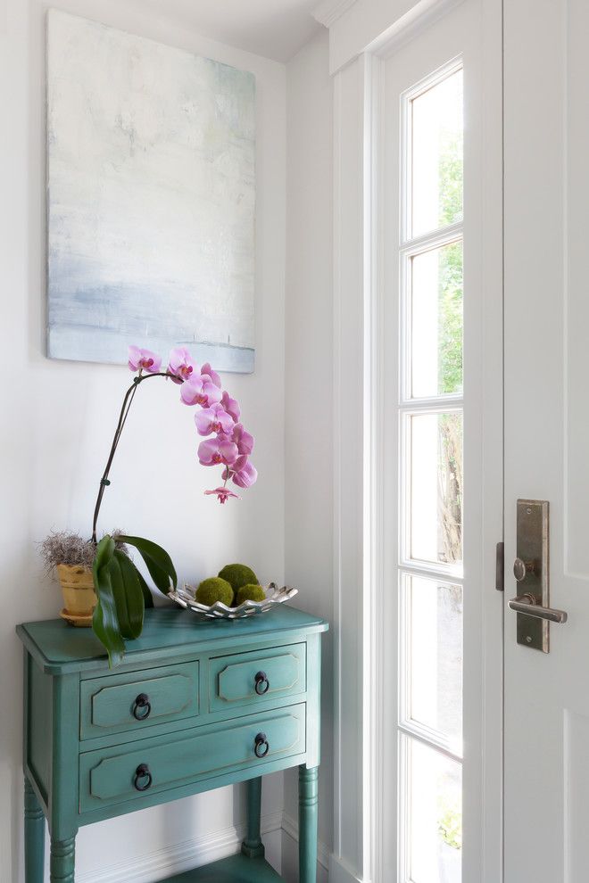 Feng Shui Basics for a Beach Style Entry with a Pink Orchid and Rockport Beach House by Reiko Feng Shui Design