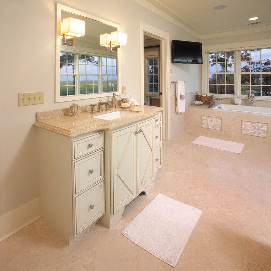 Fieldstone Cabinets for a Traditional Bathroom with a Vanity and Fieldstone Cabinetry in Coastal Living Magazine by Fieldstone Cabinetry