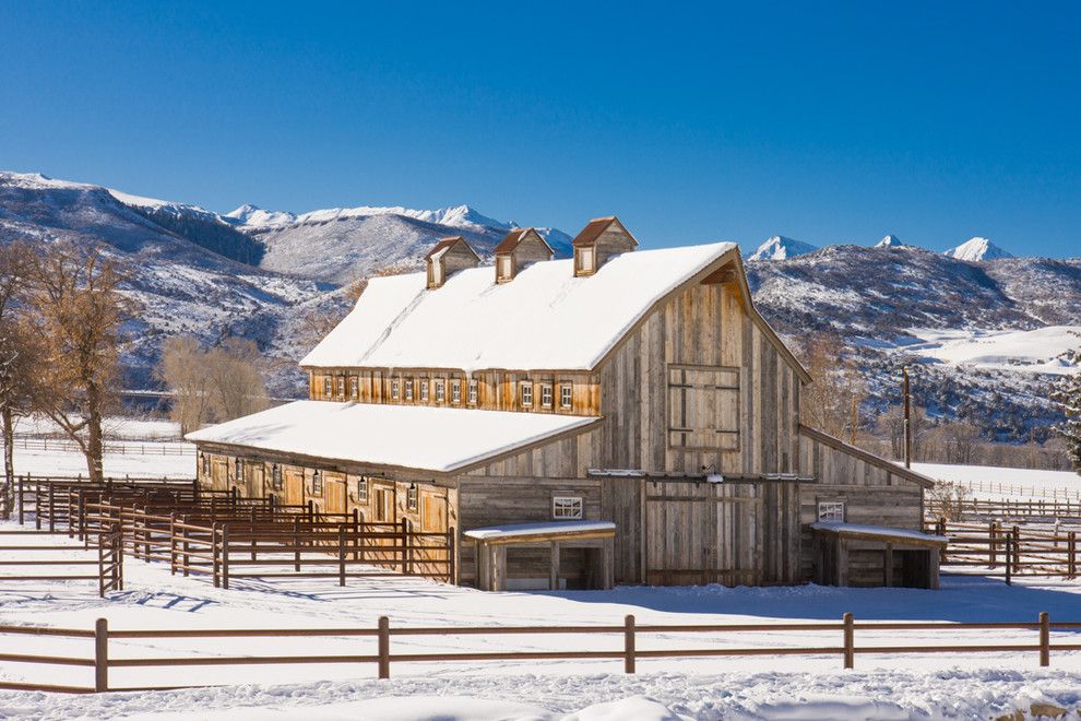 Fine Homebuilding for a Farmhouse Shed with a Gable Roof and Horse Barn by Kaegebein Fine Homebuilding