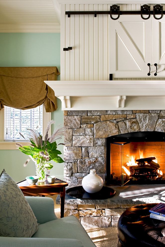 Fireplace Mantel Decor for a Traditional Bedroom with a Built in Storage and Crisp Architects by Crisp Architects