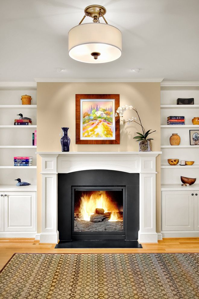 Fireplace Mantel Decor for a Traditional Family Room with a Bookcase and Queen Anne Residence 10 by Michael Knowles, Architect