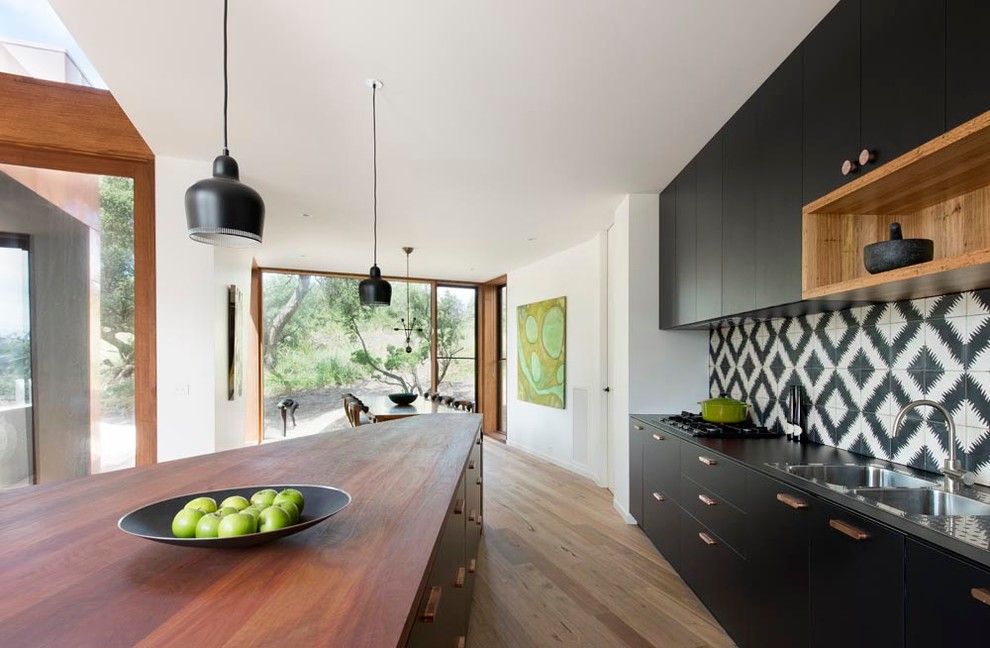 Fitzpatrick Furniture for a Contemporary Kitchen with a Timber Countertop and Bluff House Kitchen, Dining by Auhaus Architecture