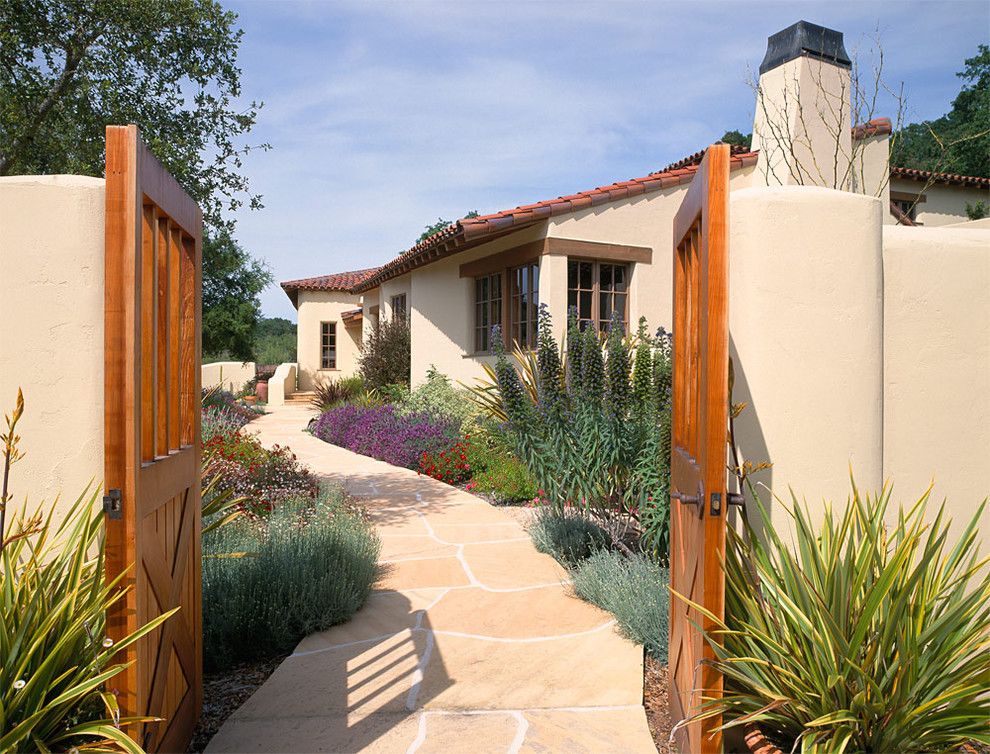 Flagstone Path for a Mediterranean Exterior with a Entry and Modern Homes by Duxbury Architects