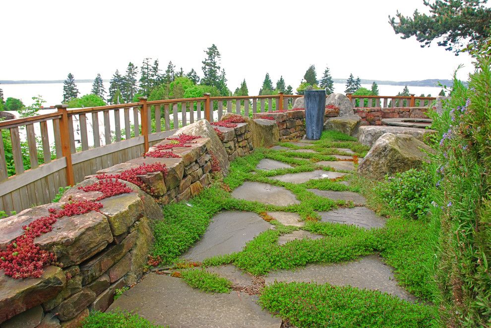 Flagstone Walkway for a Rustic Landscape with a Stone Wall and Dry Stacked Wall by Exteriorscapes Llc