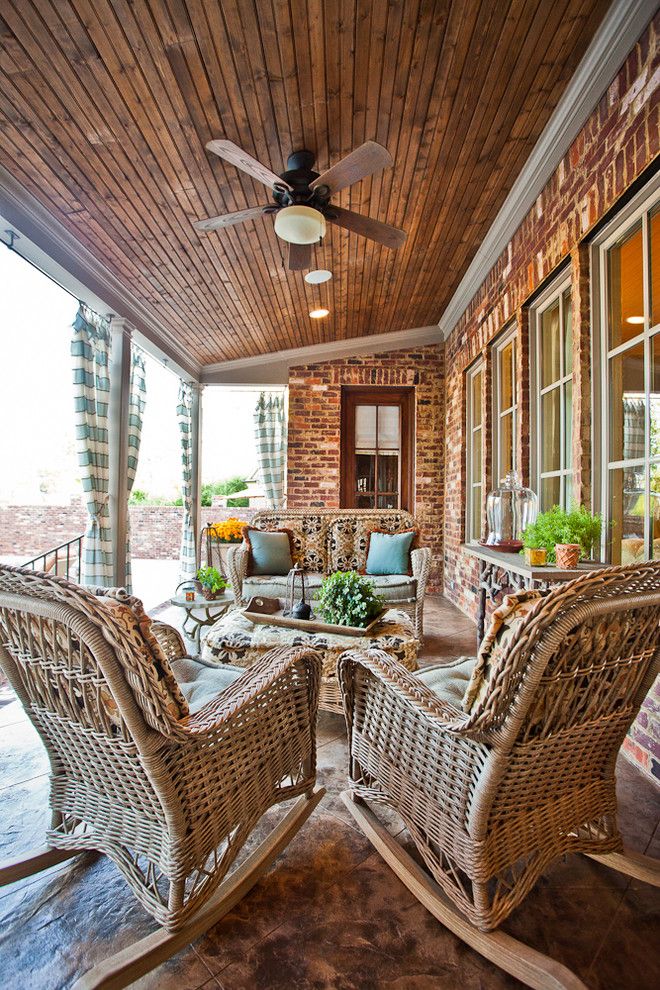 Forsyth Fabrics for a Traditional Porch with a Outdoor Furniture and Cooper Creek Back Porch by Eric Ross Interiors, Llc