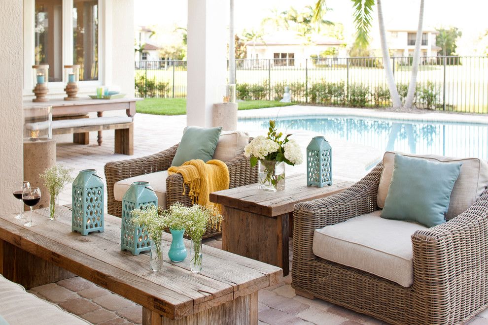 Forsyth Fabrics for a Transitional Patio with a Coffee Table and Evergrene Villa by Krista Watterworth Design Studio