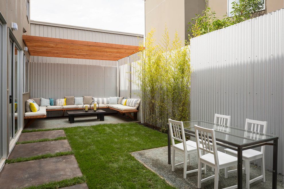 Fortunoff Backyard Store for a Industrial Patio with a Covered Patio and Bordertown by Baran Studio Architecture