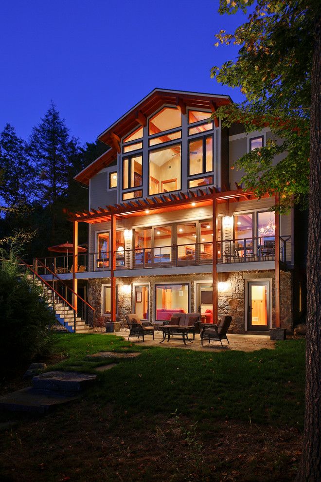 Franklin Building Supply for a Rustic Exterior with a Pergola and Bolton Landing Modern Cabin by Teakwood Builders, Inc.