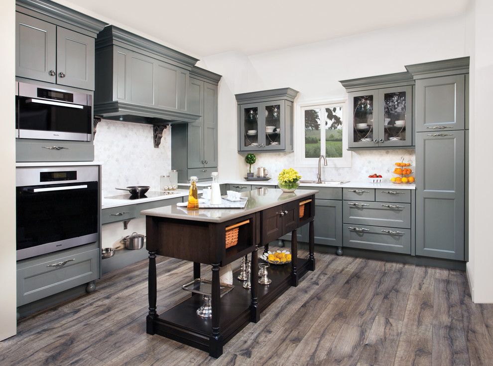 Freds Appliance for a Contemporary Kitchen with a Grey and Wellborn Cabinet by Wellborn Cabinet, Inc.