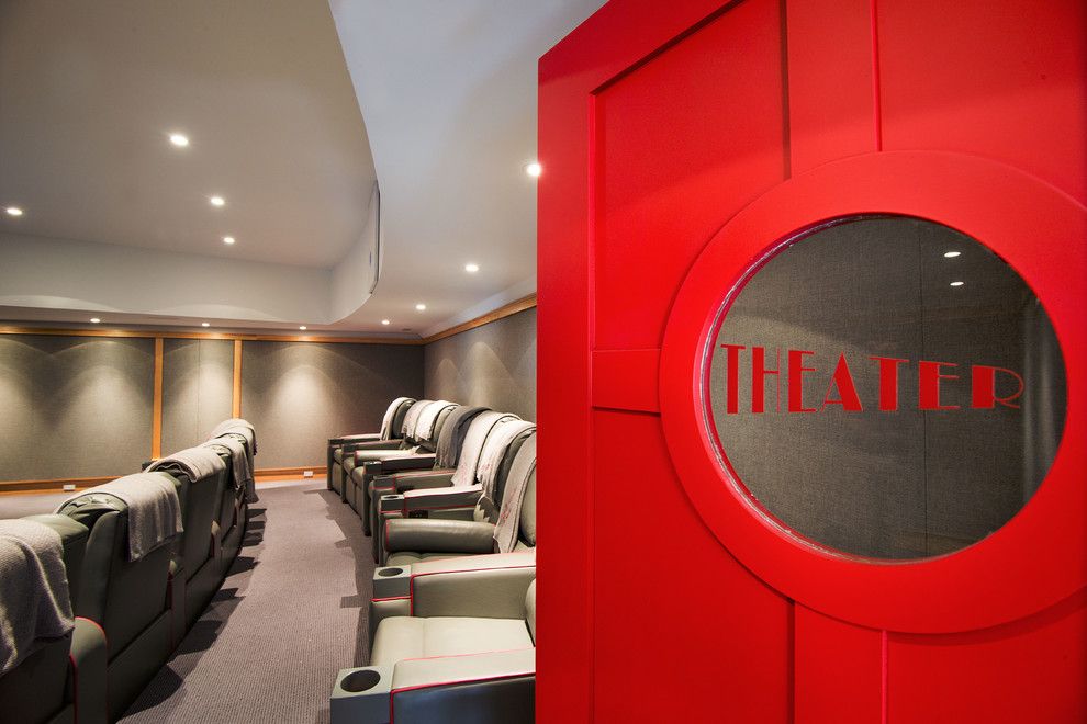 Freds Appliance for a Traditional Home Theater with a Hot Tub and Theater by Phinney Design Group