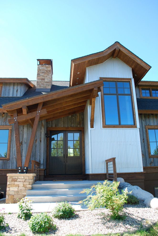 Front Porch Denver for a Contemporary Exterior with a Wood Ceiling Overhang and Eagle Ranch   West Doublehitch by Holy Cross Custom Builders, Llc