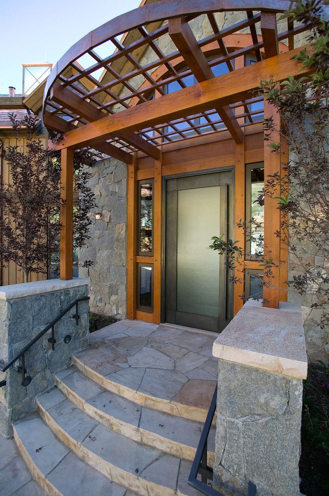 Front Porch Denver for a Contemporary Porch with a Metal Handrail and Front Entry by Dann Coffey Photography