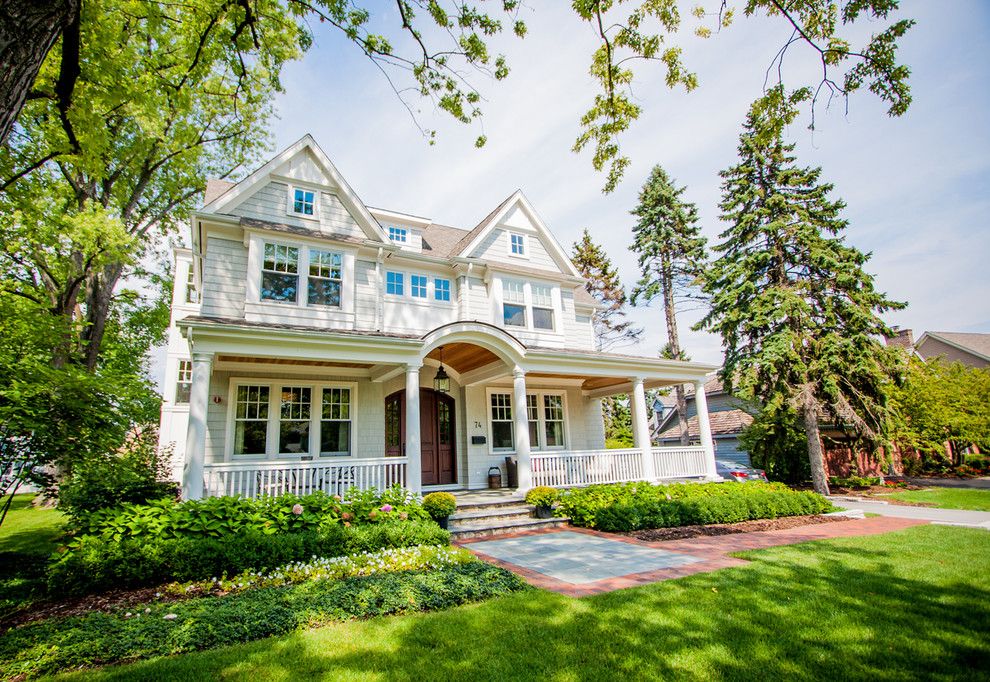 Front Porch Designs for a Traditional Exterior with a Path and Exterior by Donna Mondi Interior Design