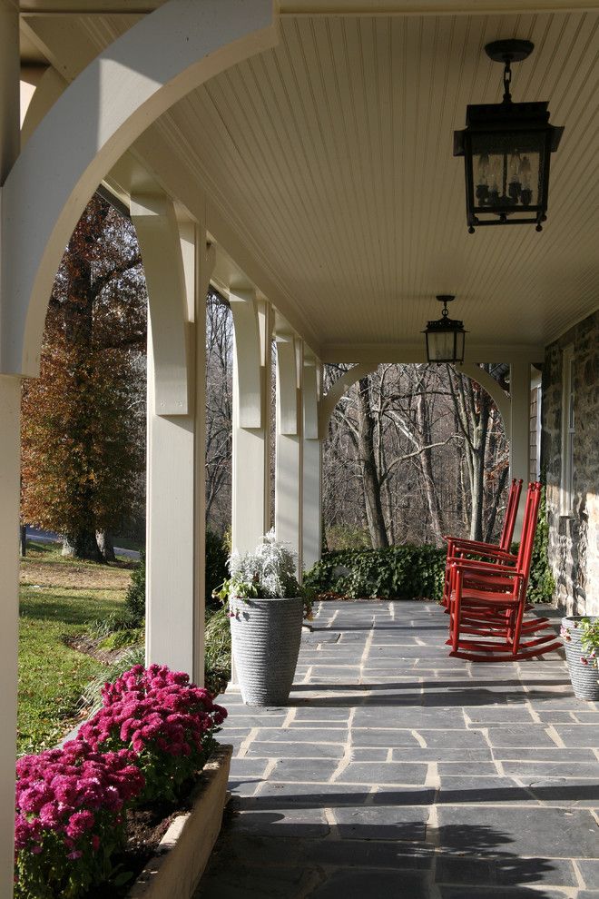 Front Porch Designs for a Traditional Porch with a Stone Paving and Front Porch by Melville Thomas Architects, Inc.